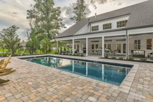 In ground pool with paver patio